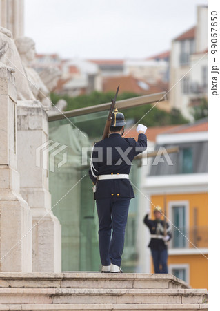 Guard of Honor near Assembly of the Republic -men patrolling the entrance to the building 99067850
