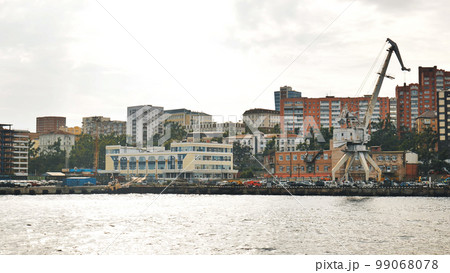 Panorama of the Russian city of Vladivstok. View from the moving ferry. 99068078
