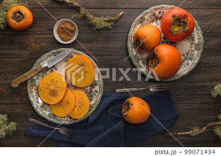 Orange persimmons Orange persimmons 99071434