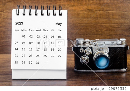 May 2023 Monthly desk calendar for the organizer to plan 2023 year with a vintage camera against. May 2023 Monthly desk calendar for the organizer to plan 2023 year with a vintage camera against. 99073532
