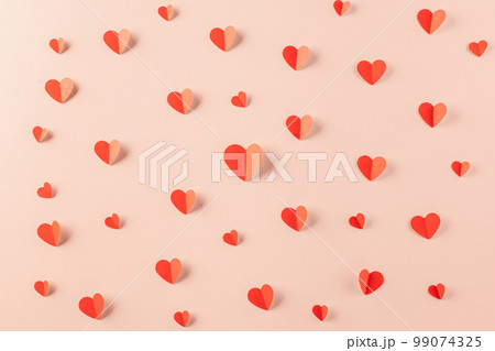 Happy Valentine Day concept. Beautiful red paper hearts shape cutting pastel pink background, Symbol of love paper art with copy space for text, Happy mother day 99074325