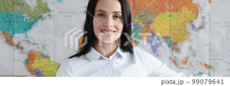 Smiling female employee of logical international company Smiling female employee of logical international company 99079641