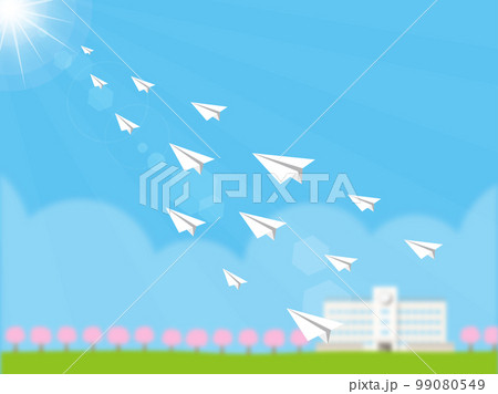 学校を背に太陽に向かって飛ぶ紙飛行機たち 99080549