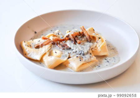 pasta or tortellini with guanciale , pasta carbonara pasta or tortellini with guanciale , pasta carbonara 99092658