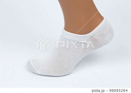 Socks on a white background. Socks on the leg. Socks on a white background. Socks on the leg. 99093264