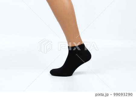 Socks on a white background. Socks on the leg. 99093290