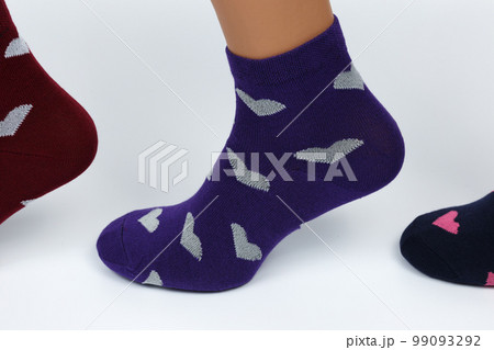 Socks on a white background. Socks on the leg. Socks on a white background. Socks on the leg. 99093292