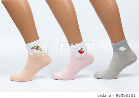 Socks on a white background. Socks on the leg. Socks on a white background. Socks on the leg. 99093303
