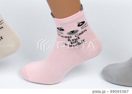Socks on a white background. Socks on the leg. Socks on a white background. Socks on the leg. 99093367