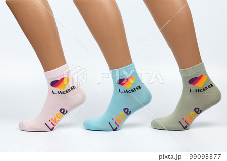 Socks on a white background. Socks on the leg. Socks on a white background. Socks on the leg. 99093377