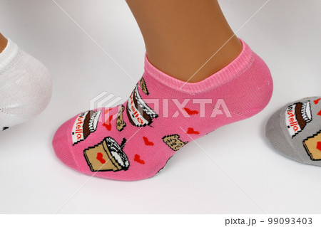 Socks on a white background. Socks on the leg. 99093403
