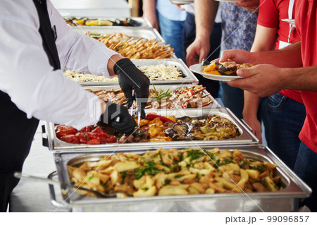 people at a banquet 99096857