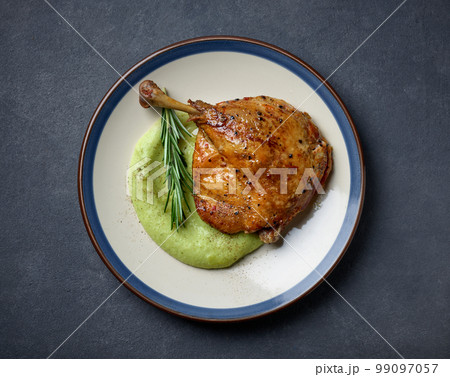 duck leg confit and broccoli puree 99097057