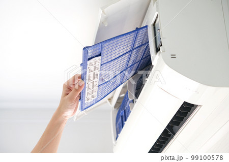 Male repair air conditioner at room, He is air technician , mechanic , engineer. Maintenance air conditioner myself. 99100578