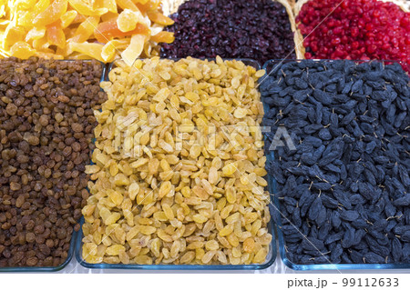 Raisin of different types, dried fruits. Delightful background or wall-paper, natural products Raisin of different types, dried fruits. Delightful background or wall-paper, natural products 99112633