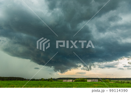 Severe thunderstorm clouds, landscape with storm clouds 99114390