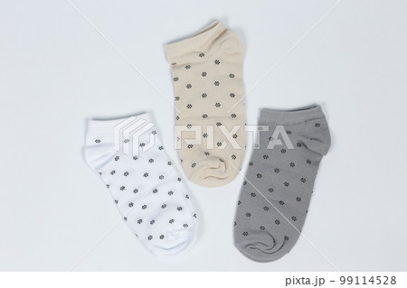 Socks on a white background. Socks on the leg. 99114528