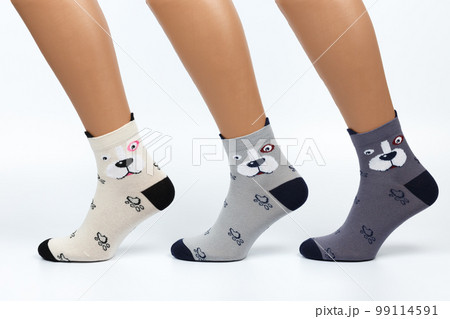 Socks on a white background. Socks on the leg. Socks on a white background. Socks on the leg. 99114591