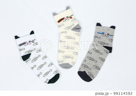 Socks on a white background. Socks on the leg. Socks on a white background. Socks on the leg. 99114592