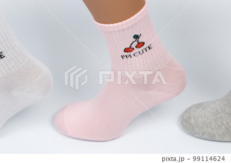 Socks on a white background. Socks on the leg. 99114624