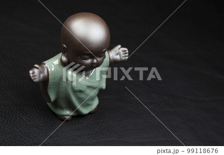 image of ceramic statue leather background 99118676