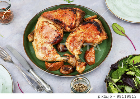 Fried chicken legs on a plate. Fried chicken legs on a plate. 99119915