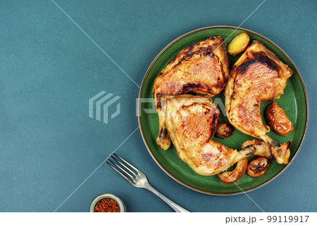 Fried quarters chicken legs, space for text Fried quarters chicken legs, space for text 99119917