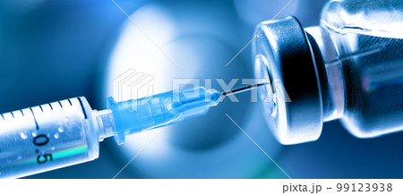 Medical syringe with a needle and a bollte with vaccine. 99123938