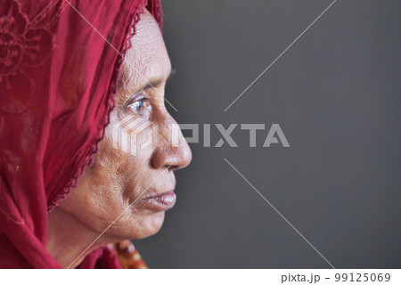 side view of thoughtful senior asian women face side view of thoughtful senior asian women face 99125069
