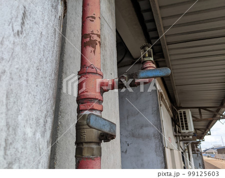 Fire Sprinkler Heads next to the concrete stone pillars Fire Sprinkler Heads next to the concrete stone pillars 99125603