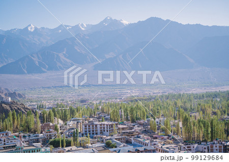 Leh town seen from above with many houses and mountains surrounded at Ladakh, in the Indian Himalayas. 99129684