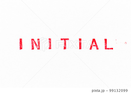 Red color rubber stamp in word initial on white paper background Red color rubber stamp in word initial on white paper background 99132099