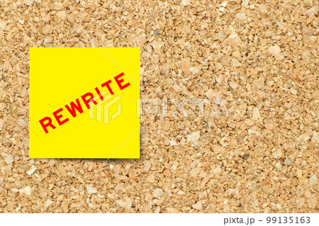 Yellow note paper with word rewrite on cork board background with copy space Yellow note paper with word rewrite on cork board background with copy space 99135163