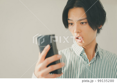 in his twenties in his twenties 99135280