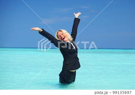 business woman in ocean 99135697