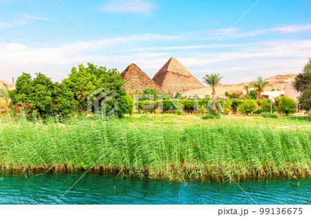 Landscape of Aswan in the Nile on the way to pyramids, Egypt Landscape of Aswan in the Nile on the way to pyramids, Egypt 99136675