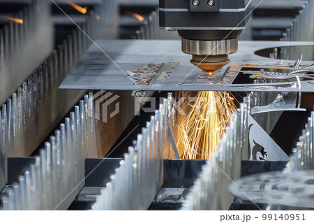 Close-up scene the fiber laser cutting machine cutting  machine cut the metal plate. 99140951