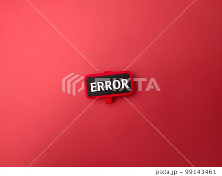 Top view red wooden board with the word ERROR on a red background. 99143461