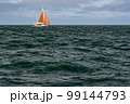 Sailboat on blue open sea with clouds on sky. Concept of travel, adventure and vacation. 99144793