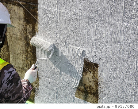 コンクリート擁壁の剥落防止工事(砂骨ローラーによる材料配り状況) コンクリート擁壁の剥落防止工事(砂骨ローラーによる材料配り状況) 99157080