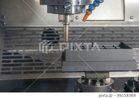 The CNC milling machine finish cutting the graphite electrode parts with solid ball end mill. The CNC milling machine finish cutting the graphite electrode parts with solid ball end mill. 99158369