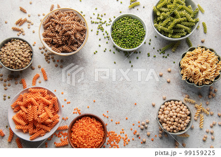 A variety of fusilli pasta from different types of legumes. Gluten-free pasta. 99159225