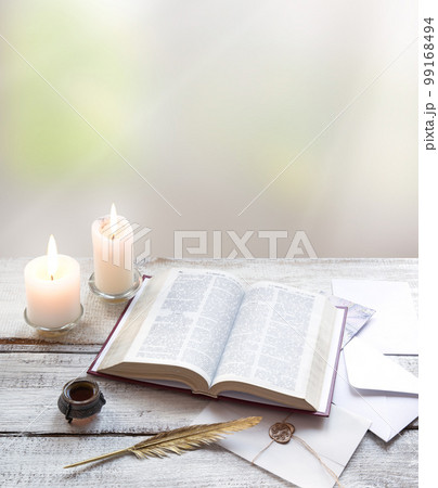 Bible on white wooden table Bible on white wooden table 99168494