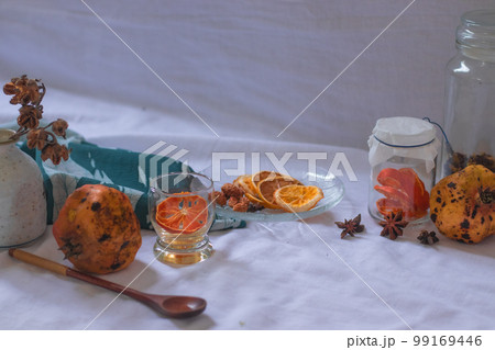Dried lemon slices and aromatics on a platter in preparation for a relaxing aromatherapy session at home Dried lemon slices and aromatics on a platter in preparation for a relaxing aromatherapy session at home 99169446