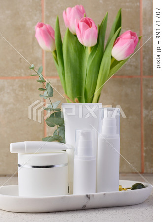 White plastic tube, jar for cosmetics. Container for gel, cream, tonic. Advertising and product promotion 99171707