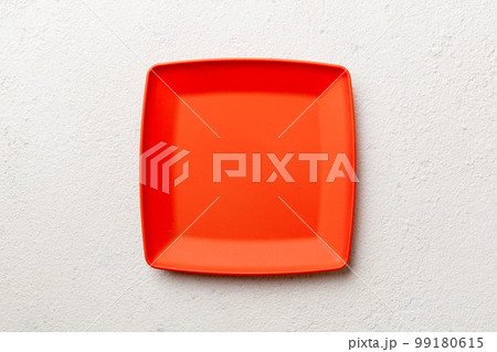 Top view of empty square plate on cement background. Empty space for your design 99180615