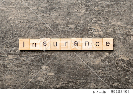 insurance word written on wood block. insurance text on table, concept insurance word written on wood block. insurance text on table, concept 99182402