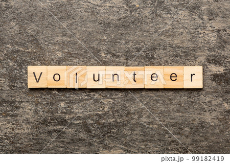 volunteer word written on wood block. volunteer text on table, concept. 99182419