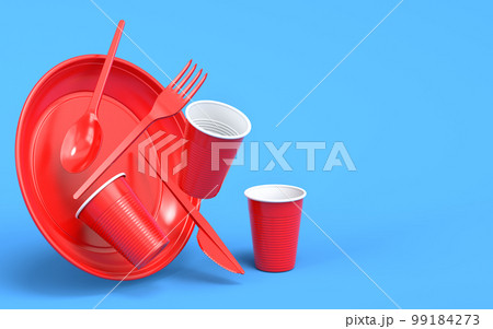 Set of disposable utensils like plate, folk, spoon,knife and cup on blue Set of disposable utensils like plate, folk, spoon,knife and cup on blue 99184273