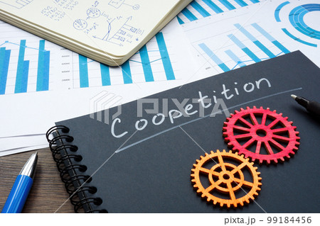 Notebook with inscription coopetition and cog wheels. Notebook with inscription coopetition and cog wheels. 99184456